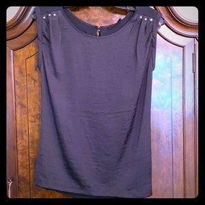 Limited black sleeveless top.